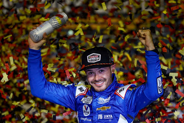 Kyle Larson celebrates in victory lane Sunday night at Darlington Raceway after winning the Southern 500, giving him an automatic berth in the next round of the playoffs. Photo: Getty Images for NASCAR.